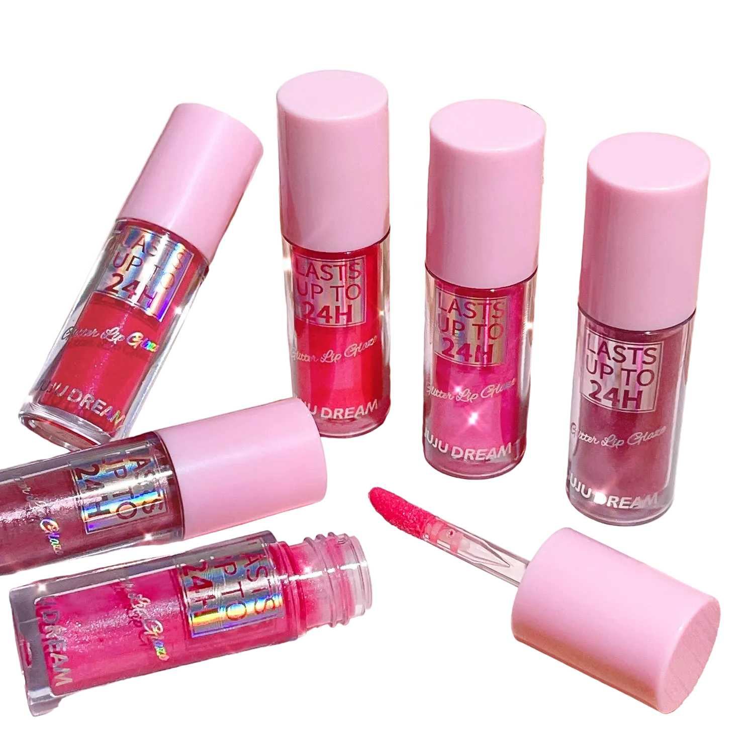 Set of pink lip glosses with visible brand name on a light background